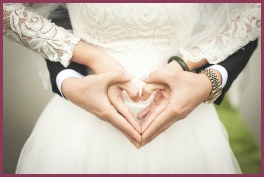 Hands held together in heart shape