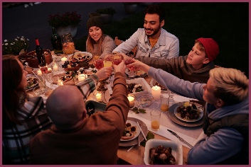 Family and friends enjoying outside meal
